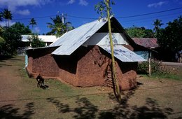Coconut-palms;-Comoros-Archipelago;-France;-Goat;-House;-Housing;-Indian-Ocean;-Kaleidos;-Kaleidos-images;-La-parole-à-limage;-Laurent-Abad;-Mayotte;-Mud-wall;-Stories-Pictures;-Tin-roof;-Village